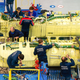 Illustration for article titled These Riveting Photos Show How Russias Su-34 Fullback Fighter-Bombers Get Built
